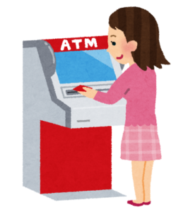 銀行のATMで電話占い料金を支払う